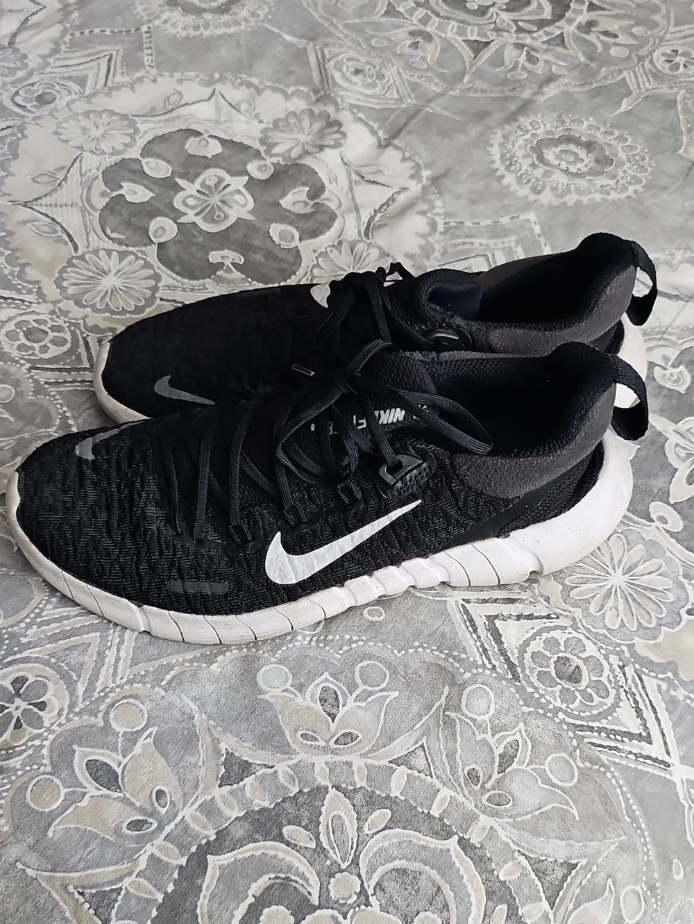 Nike Black Athletic Shoes with White Swoosh